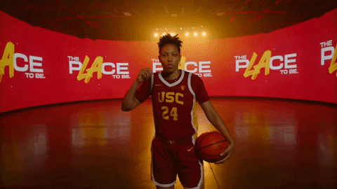 Usc Player Flexing Jersey Number Twenty Four GIF