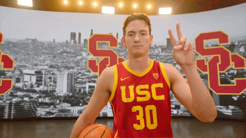 Usc Player Gesturing Peace Sign GIF