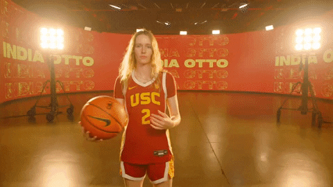 Usc Player Holding Ball On Shoulder GIF
