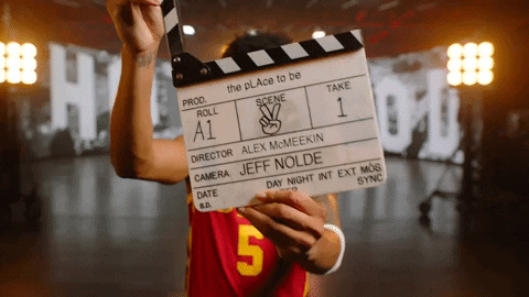 Usc Player Holding Clapperboard GIF