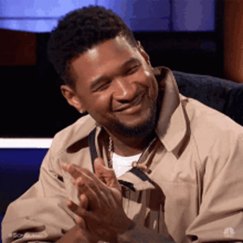 Usher Flirty Finger Gun Meme GIF