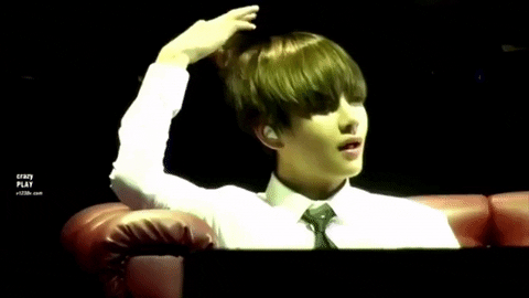 V Curling His Hair GIF
