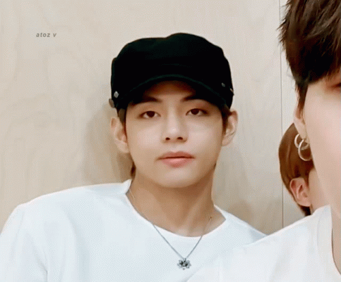 V Is Forced To Smile At The Camera GIF