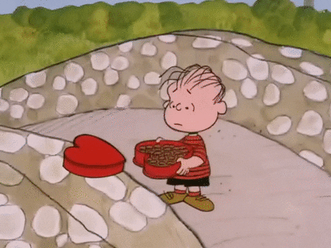 Valentines Day Frustrated Charlie Brown Throwing Chocolates GIF