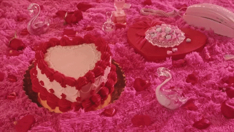 Valentines Day Placing Gift Card Heart Shaped Cake GIF
