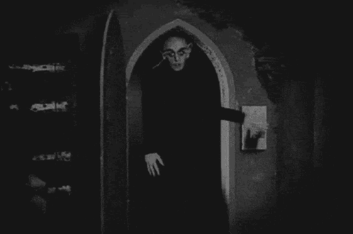 Vampire Standing In Archway GIF