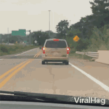 Van Driving Past Viralhog Sign