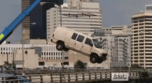 Van Lifted Over Bridge by Crane With AMC.com