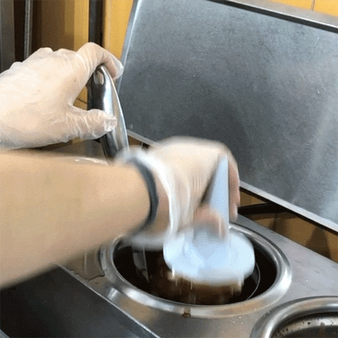 Vanilla Ice Cream Dip Into Chocolate GIF