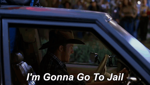 Varsity Blues Man Driving Police Car GIF