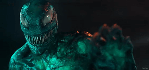 Venom Character Close Up Dark Room Green Background GIF