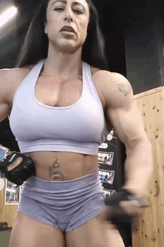 Very Muscular Woman Crop Top And Shorts Gym