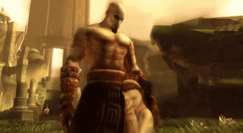 Video Game Man Next to Woman with E on Skirt