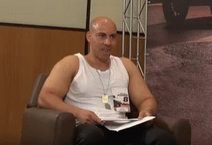 Vin Diesel Seating On A Couch GIF