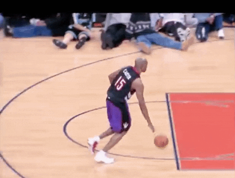 Vince Carter Dunk And Rim Hanging GIF