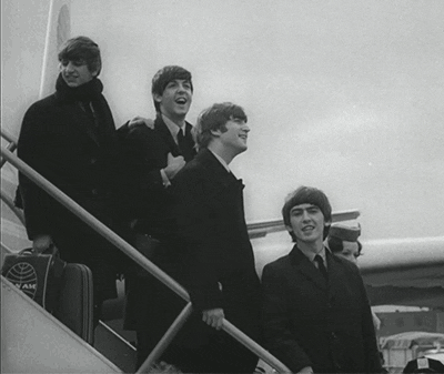 Vintage Beatles Group Exiting Plane GIF