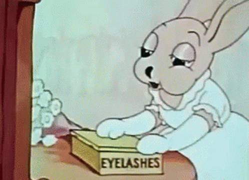Vintage Cartoon Putting Eyelashes GIF