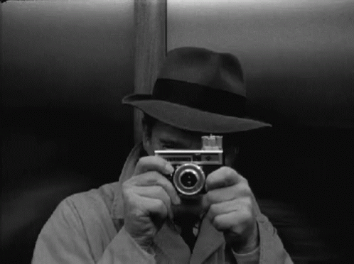 Vintage Detective Clicking Picture GIF