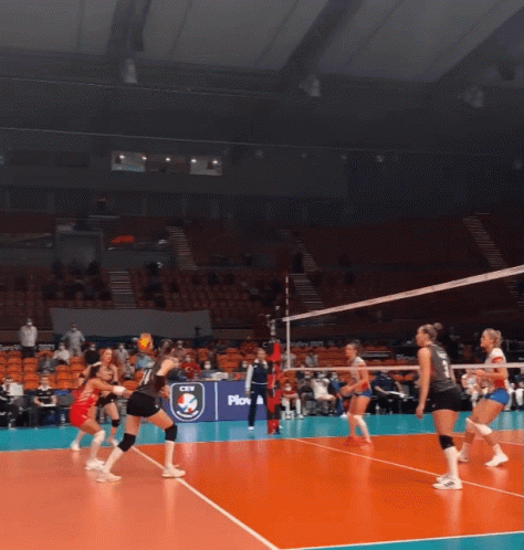 Volleyball Game in Stadium with CVV Banner