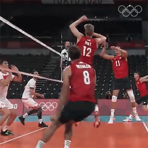 Volleyball Players Playing With Number 8 Jersey