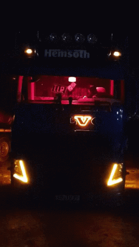 Volvo Truck Lit Up In Dark GIF