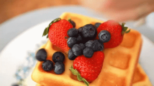 Waffle Topped with Strawberries and Blueberries