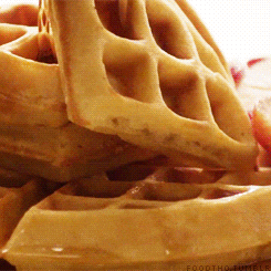 Waffles With Flowing Honey Closeup Shot GIF