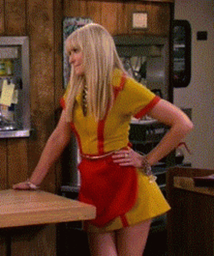 Waitress In Yellow And Red Outfit GIF
