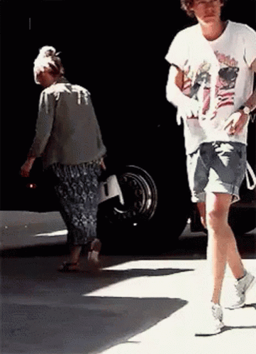 Walking Man On Denim Short GIF