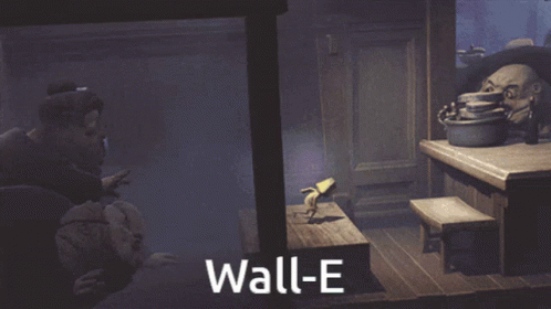 Wall-E Poster With Monsters on Table