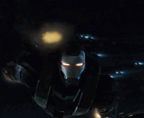 War Machine Shooting While Flying GIF