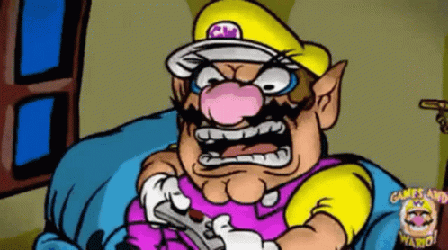 Wario Playing Online Games GIF