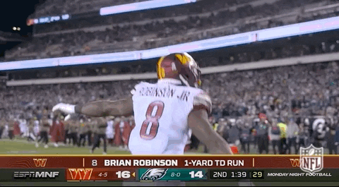 Washington Commanders Brian Robinson Jr Tiptoe Raise Arms GIF