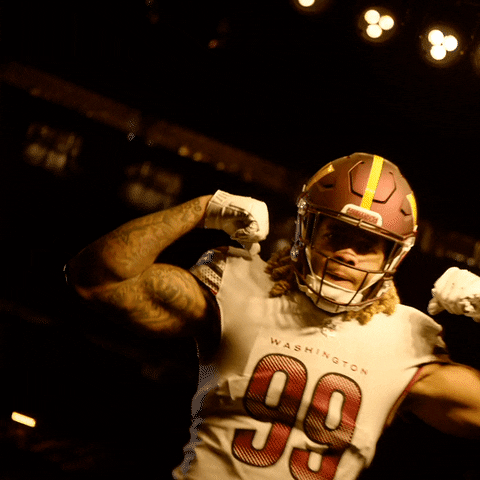 Washington Commanders Chase Young Flex Biceps GIF