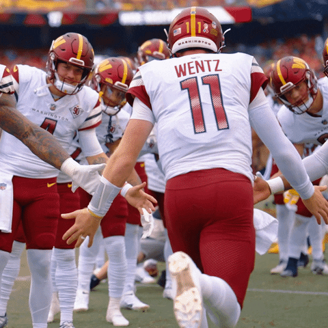 Washington Commanders Player 11 Low Fives Other Players GIF