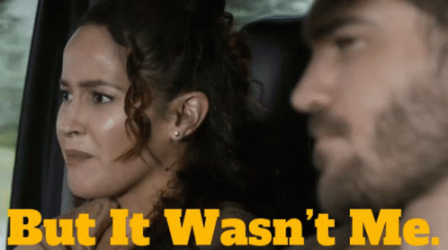 Curly Woman Saying It Wasnt Me GIF