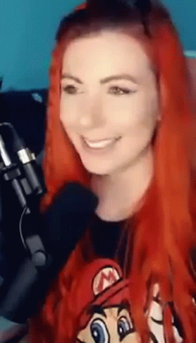 Smiling Red Hair Girl Watching You GIF