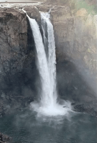 Waterfall Surrounded By Cliffs And Road GIF