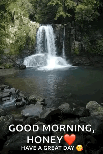Waterfall Surrounded by Rocks and Trees Saying Good Morning