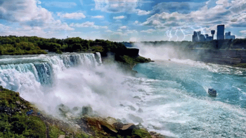 Waterfall With City And Boat GIF