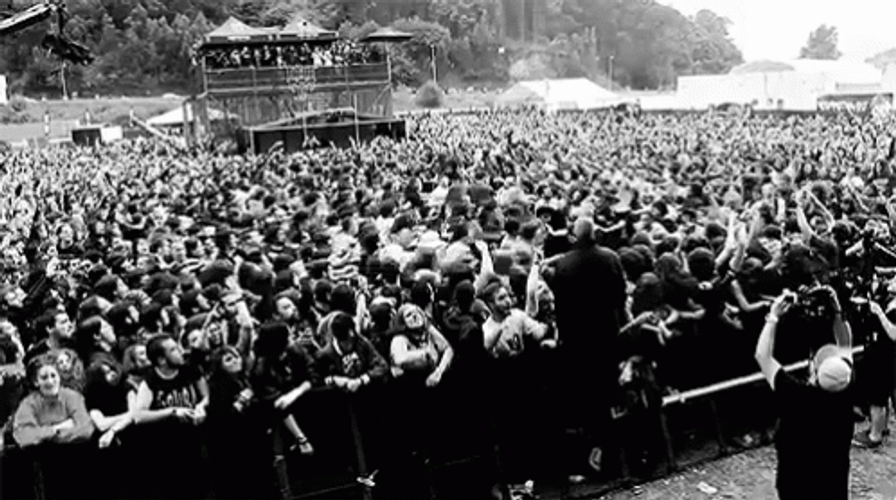 Wave Of Fans Moving In Mosh Pit GIF