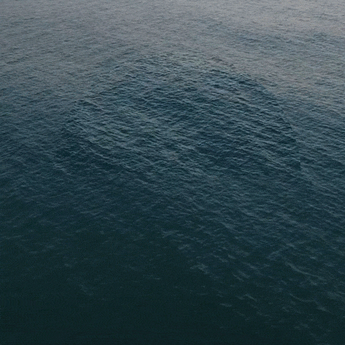Calm Waves In The Center Of The Ocean GIF