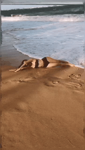 Waves Crashing On Sandy Beach GIF