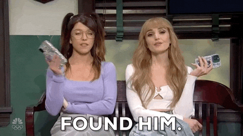 We Aint Found Two Women Holding Phone GIF