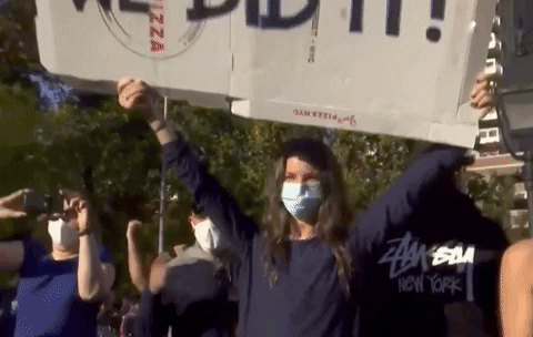 We Did It Joe People Holding Placard GIF