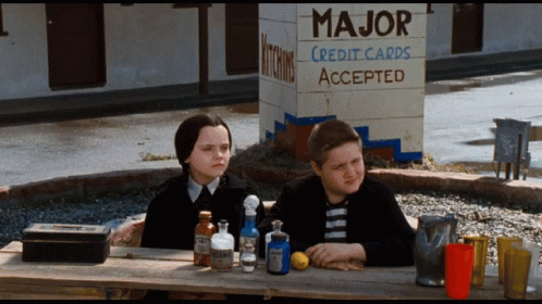 Peacefully Sitting Wednesday Addams GIF
