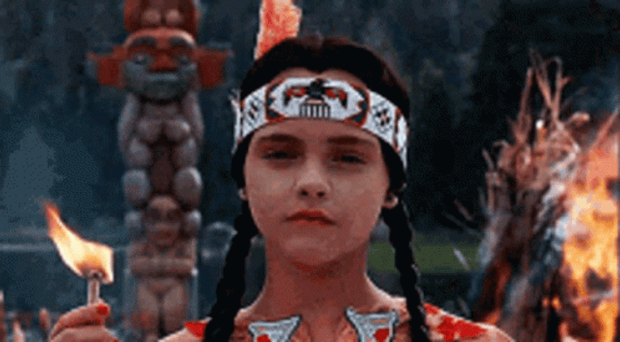 Wednesday Addams Creepy Holding A Match GIF