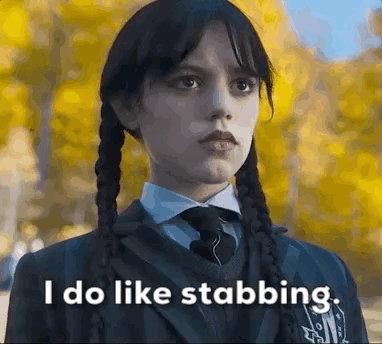Wednesday Addams Likes Stabbing Meme GIF
