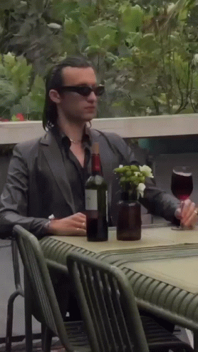 Weird Guy Drinking Wine In Rain GIF