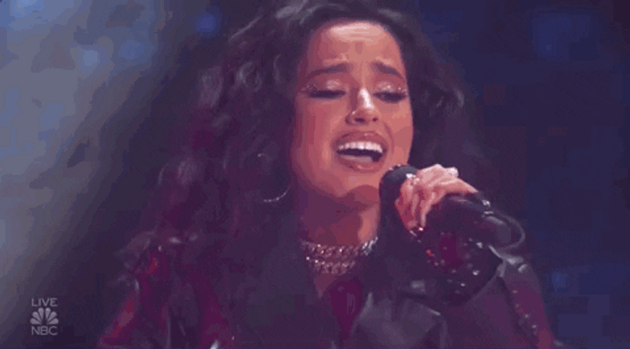 Well-dressed Becky G Emotional Singing GIF